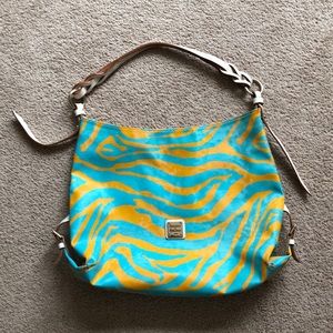 Dooney & Bourke aqua and yellow zebra print bag.